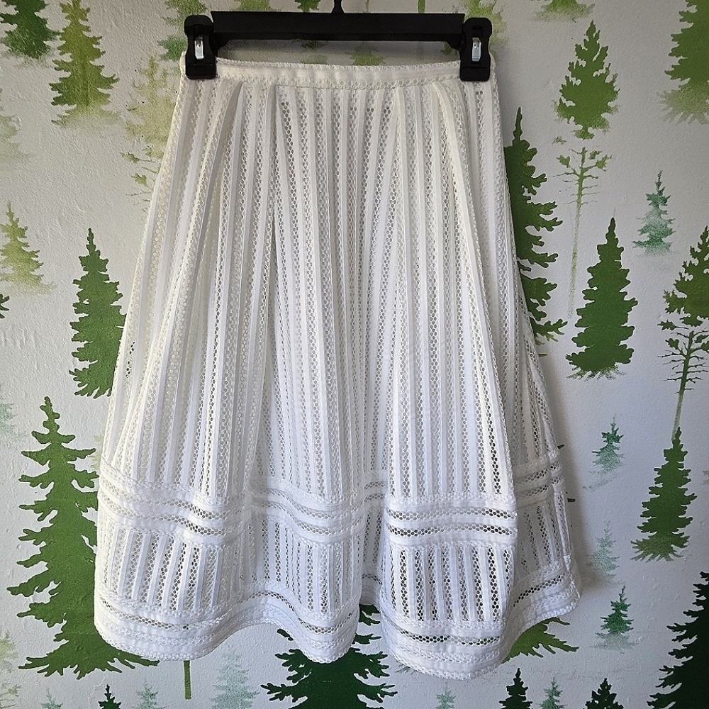Elegant White H&M Laser Cut Lace Skirt